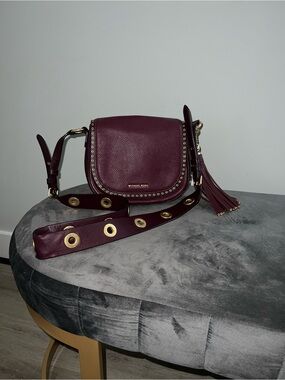 Michael Kors Plum Leather Crossbody with Gold Grommet Strap